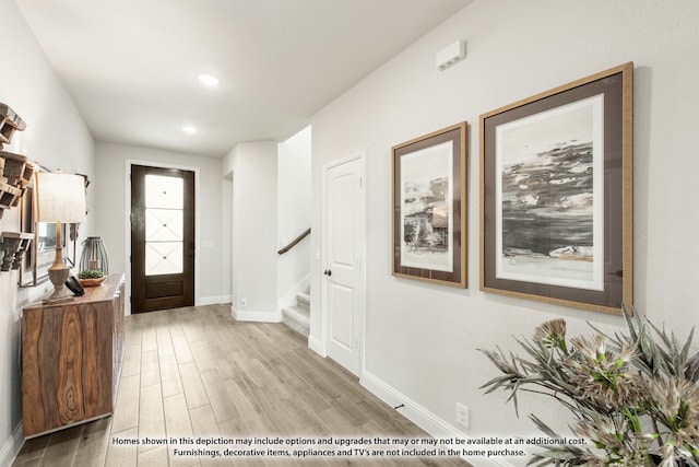 foyer entrance featuring light hardwood / wood-style floors