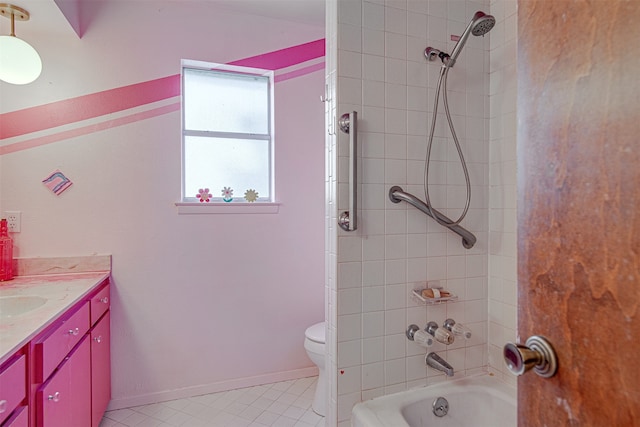 full bathroom featuring tile patterned flooring, vanity, toilet, and tiled shower / bath