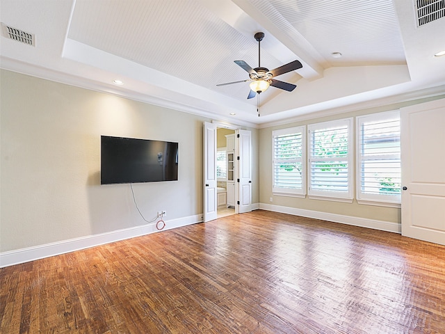 unfurnished living room featuring ornate columns, wood-type flooring, lofted ceiling with beams, and ceiling fan