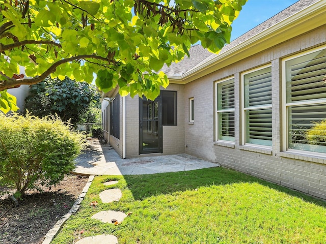 view of yard with a patio area