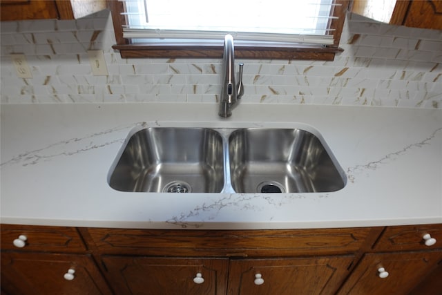 room details with backsplash and sink