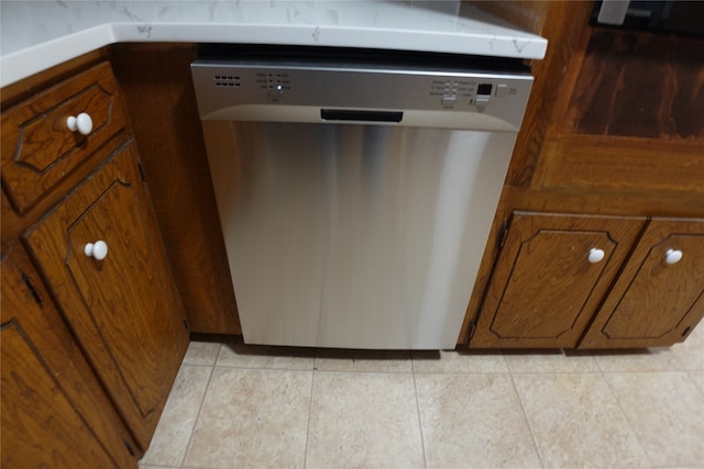 room details with dishwasher and light tile patterned floors