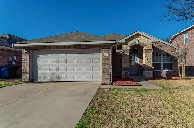 ranch-style home featuring a garage and a front yard