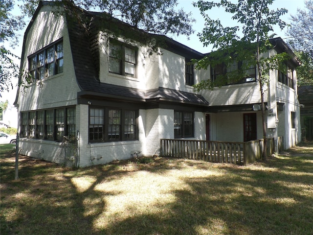 exterior space with a front yard