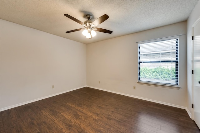 unfurnished room with ceiling fan, a textured ceiling, and dark hardwood / wood-style floors