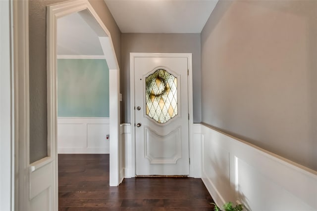 doorway to outside featuring dark wood-type flooring