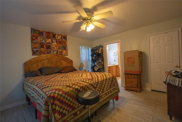 bedroom with ensuite bathroom and ceiling fan