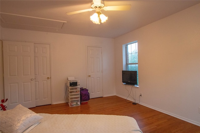 unfurnished bedroom featuring ceiling fan and wood-type flooring