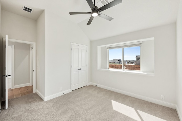 unfurnished bedroom featuring a closet, baseboards, visible vents, and carpet flooring