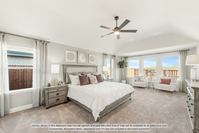 bedroom featuring lofted ceiling, ceiling fan, and light colored carpet