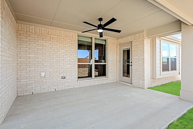 view of patio featuring ceiling fan