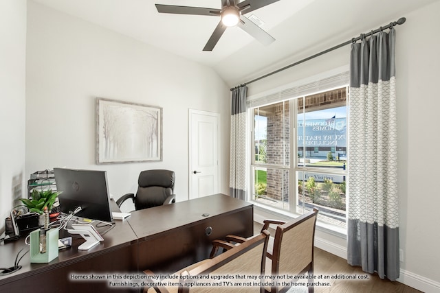 office space with vaulted ceiling, hardwood / wood-style floors, and ceiling fan