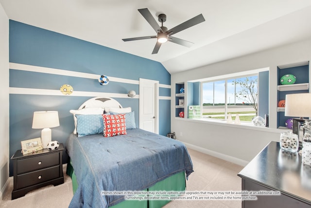 carpeted bedroom featuring lofted ceiling and ceiling fan