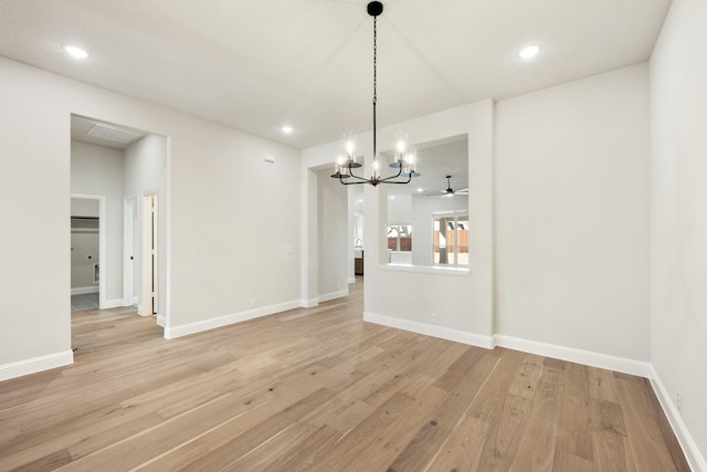 unfurnished dining area with recessed lighting, light wood-style flooring, and baseboards