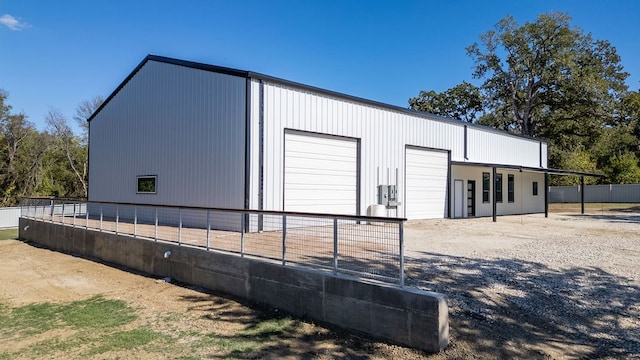 view of outbuilding featuring a garage