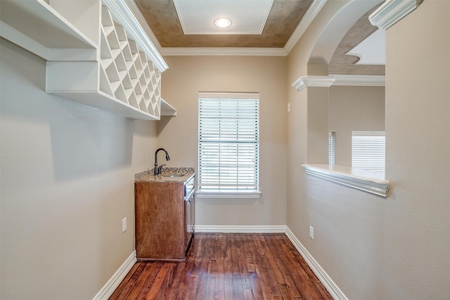 interior space featuring sink and dark hardwood / wood-style flooring