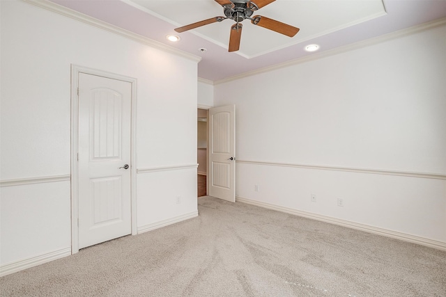 unfurnished bedroom with light carpet, ceiling fan, and crown molding