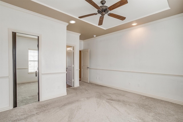 unfurnished bedroom with light carpet, ceiling fan, and ornamental molding