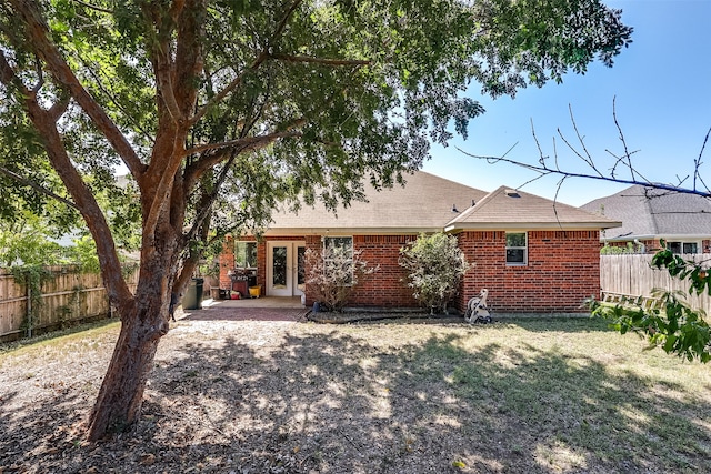 back of house featuring a patio