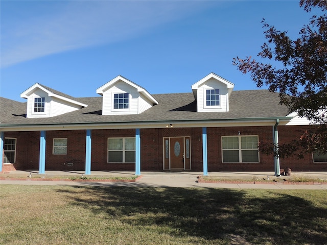 view of front of property with a front lawn and a porch