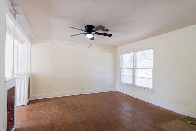 unfurnished room with ceiling fan and dark wood-type flooring