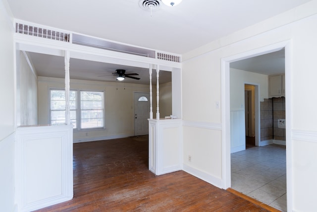 spare room with ceiling fan and hardwood / wood-style floors