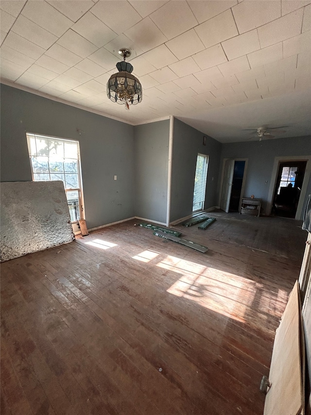 interior space featuring dark hardwood / wood-style floors and ceiling fan