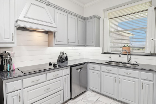 kitchen with custom exhaust hood, dark stone counters, sink, stainless steel dishwasher, and black electric cooktop