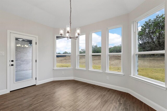 unfurnished bedroom with light colored carpet, ensuite bath, ceiling fan, and lofted ceiling