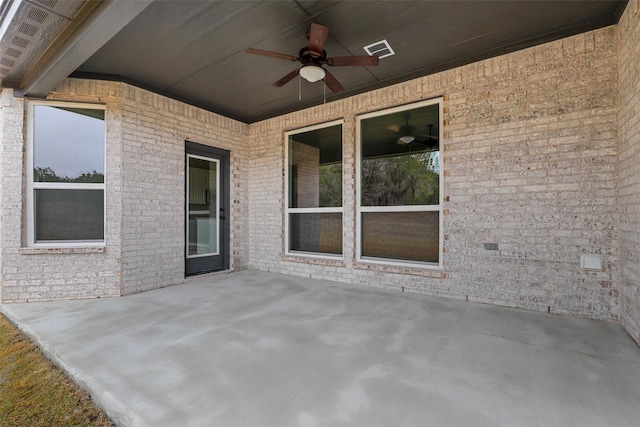 view of patio / terrace featuring ceiling fan