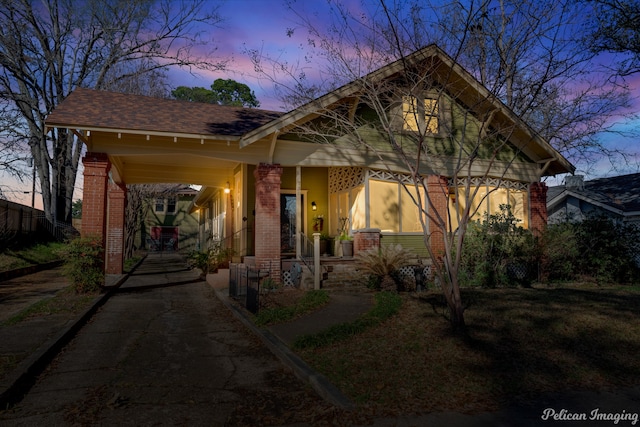 craftsman-style home featuring covered porch