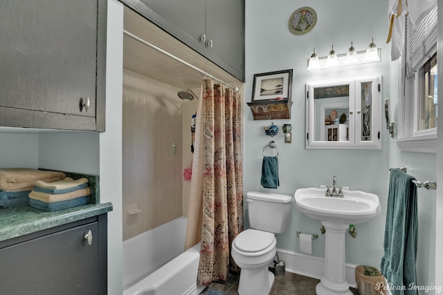 bathroom with shower / bathtub combination with curtain, tile patterned floors, and toilet