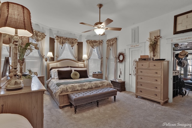 carpeted bedroom featuring ceiling fan