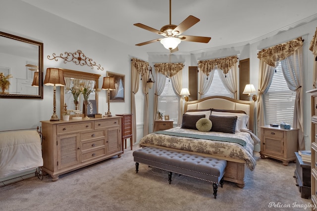 bedroom featuring ceiling fan and light colored carpet