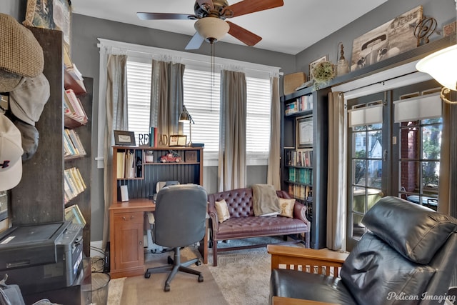 office area with ceiling fan and plenty of natural light