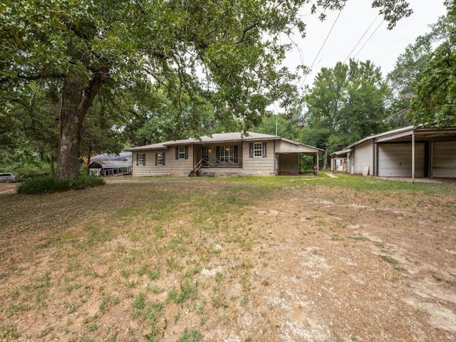 back of house with a yard