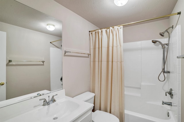 full bathroom featuring vanity, shower / tub combo, a textured ceiling, and toilet