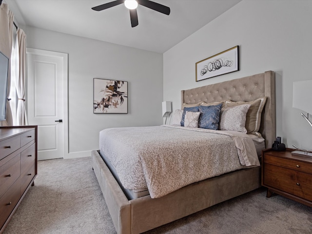 bedroom with light carpet and ceiling fan