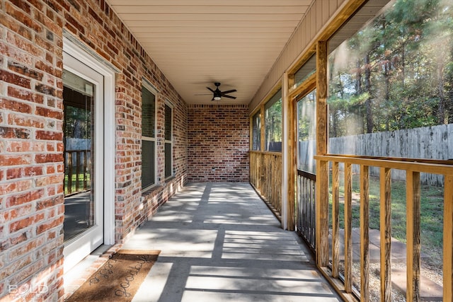 exterior space featuring ceiling fan