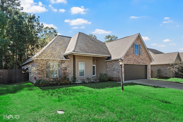 view of front facade featuring a garage and a front lawn