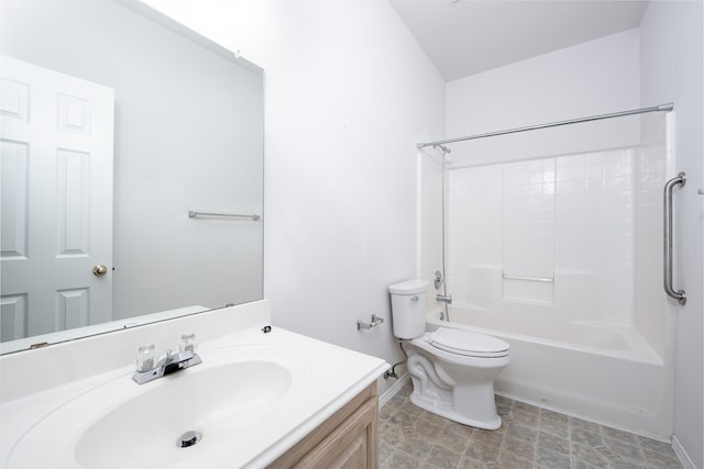 full bathroom featuring bathing tub / shower combination, vanity, and toilet