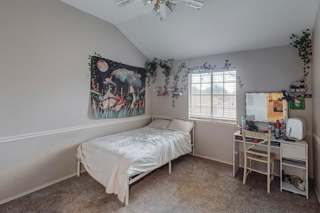 carpeted bedroom with ceiling fan and vaulted ceiling