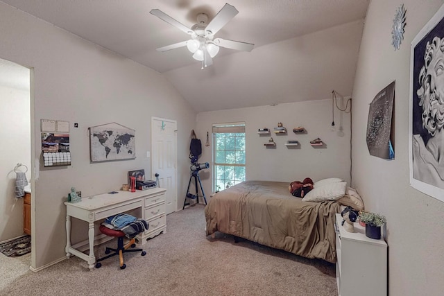 bedroom featuring ceiling fan, light colored carpet, and lofted ceiling