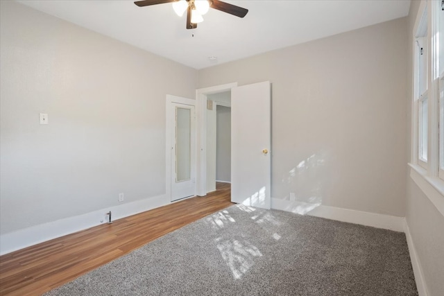 unfurnished room featuring wood-type flooring and ceiling fan