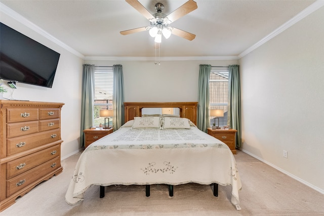 bedroom featuring ornamental molding, multiple windows, and ceiling fan