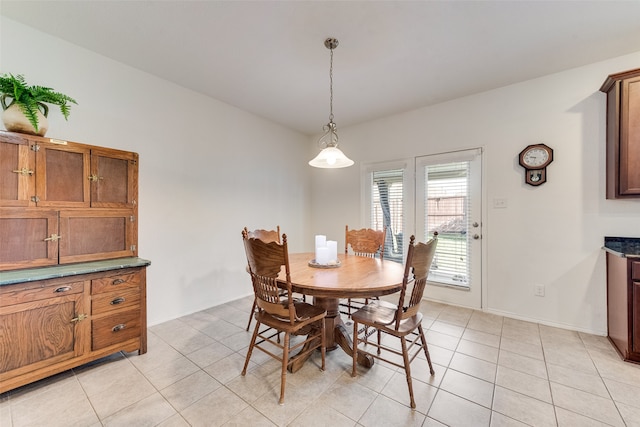 view of tiled dining space