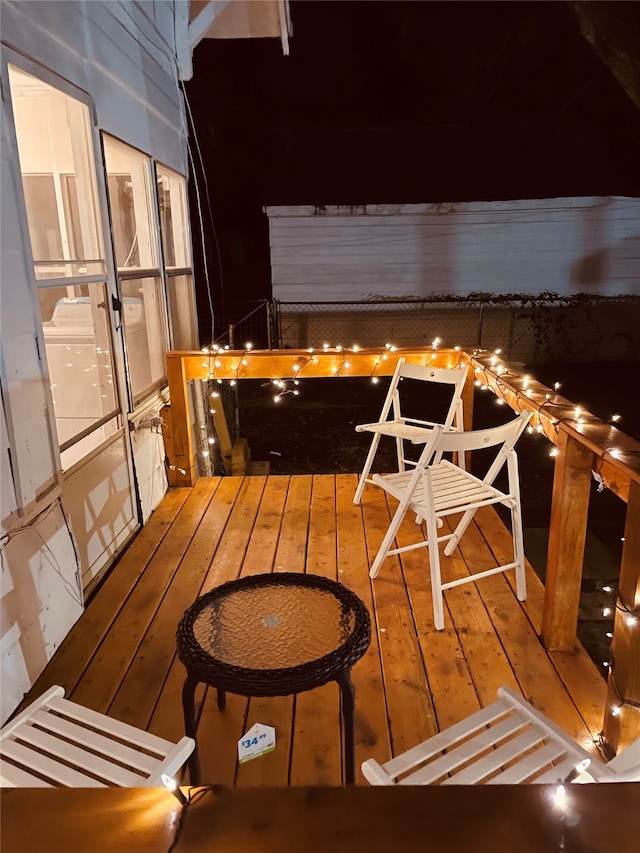 view of balcony at night