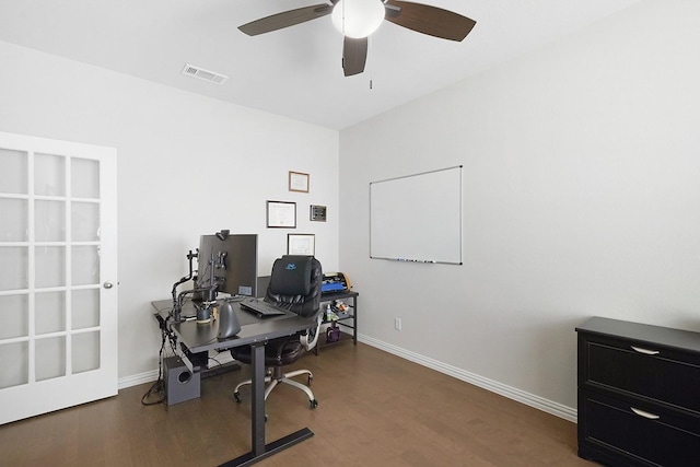 office with dark wood-type flooring and ceiling fan