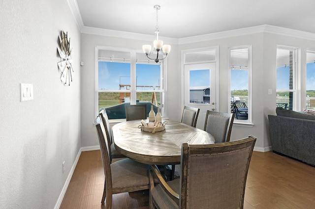 12712 Cold Spring Ln, Ponder, TX 76259 - dining space with a chandelier, healthy amount of natural light, wood finished floors, and crown molding
