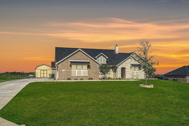 12712 Cold Spring Ln, Ponder, TX 76259 - view of front of home featuring a front lawn, a chimney, stone siding, and a storage shed